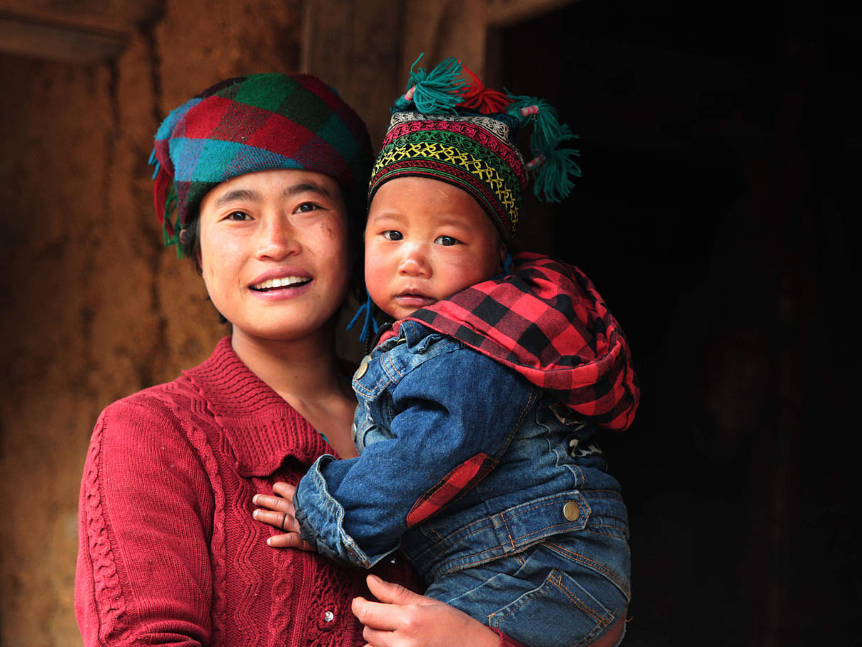 Frau mit Kind in Sechuan, China © Wang Yue