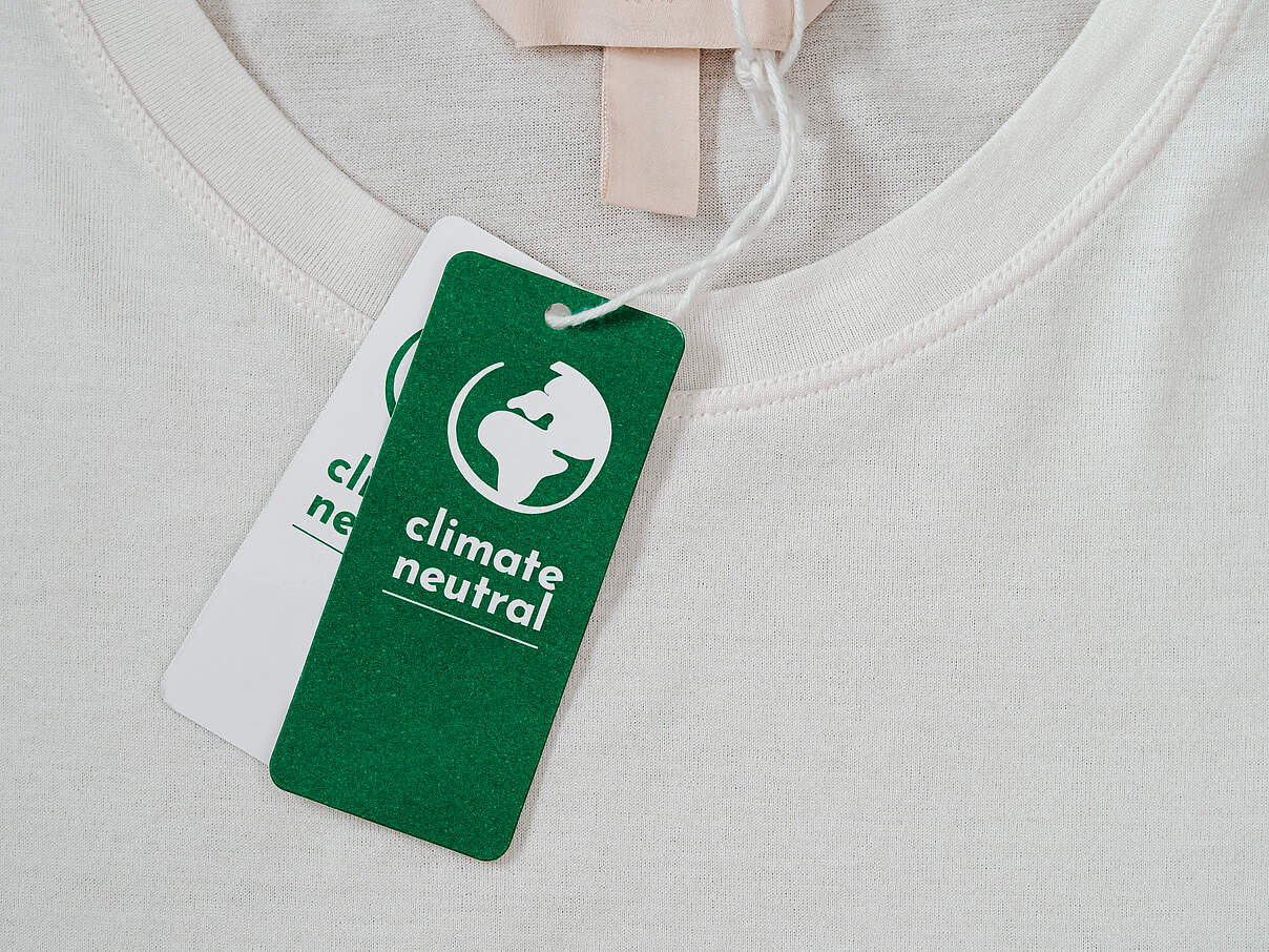 Climate neutral, carbon label on clothes concept